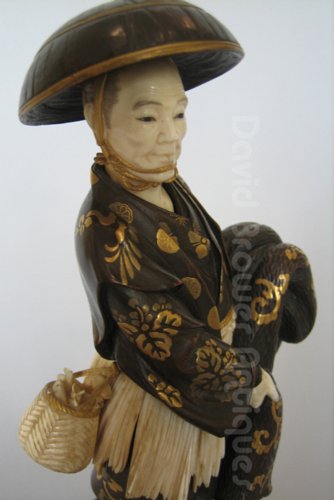 Japanese wood & ivory figure of a fisherman by Miyao, unsigned